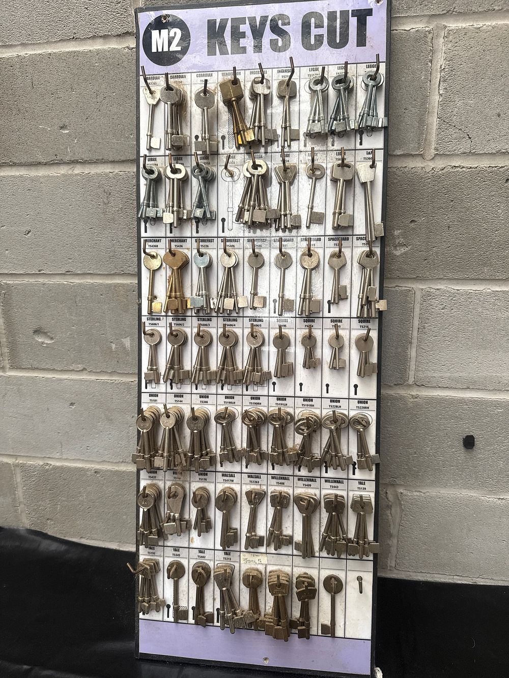 Lot 448: M2 Keys Cut Retail Locksmith Display Board with Assorted Key Blanks