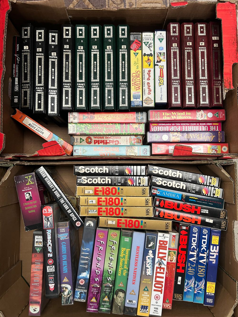 Lot 475: A Large Collection of VHS Video Cassette Tapes and an Audio Cassette