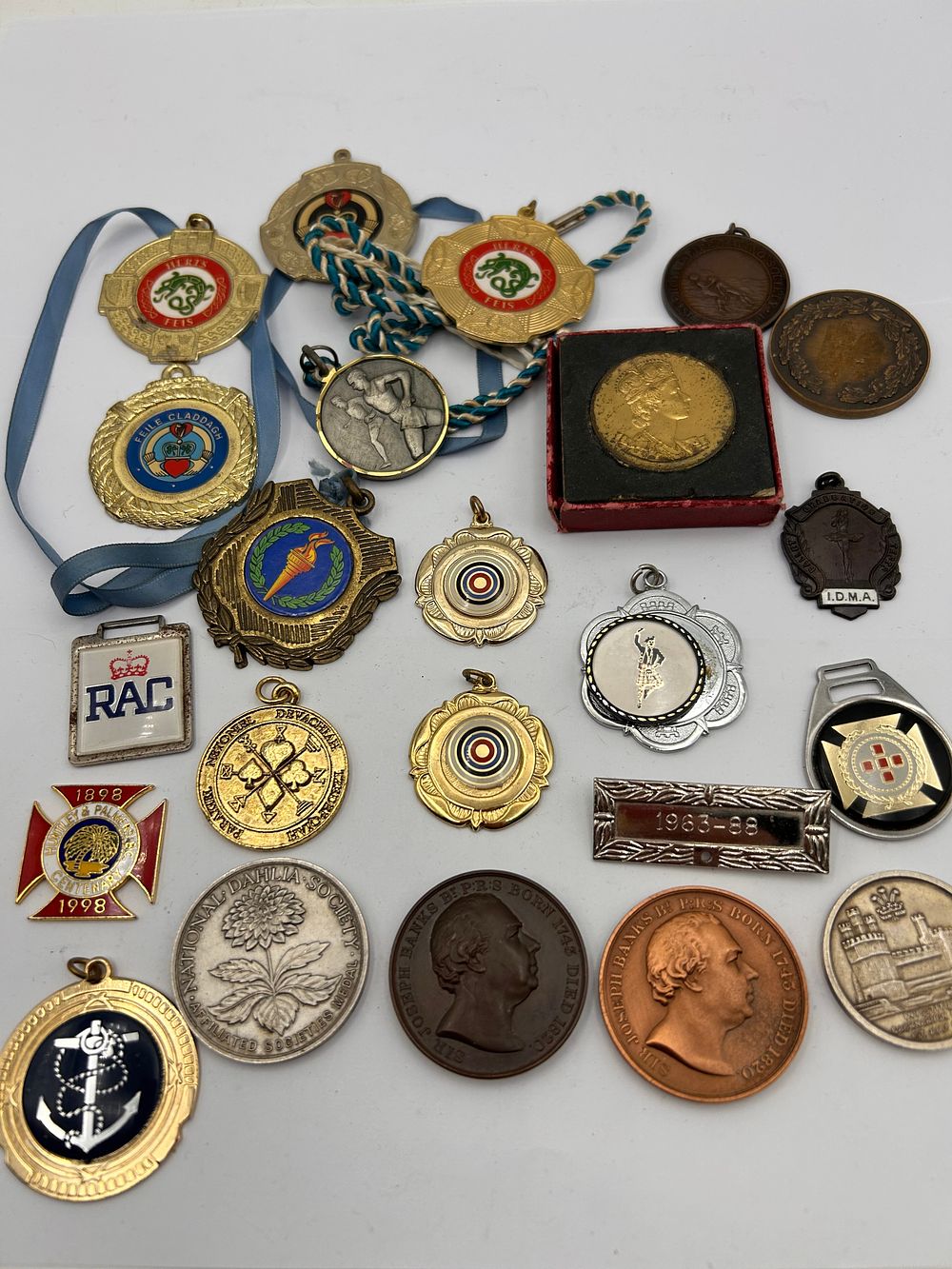 Lot 491: A Collection of Medals, Medallions, Commemorative Coins, and Badges, Late 19th to Early 21st Century