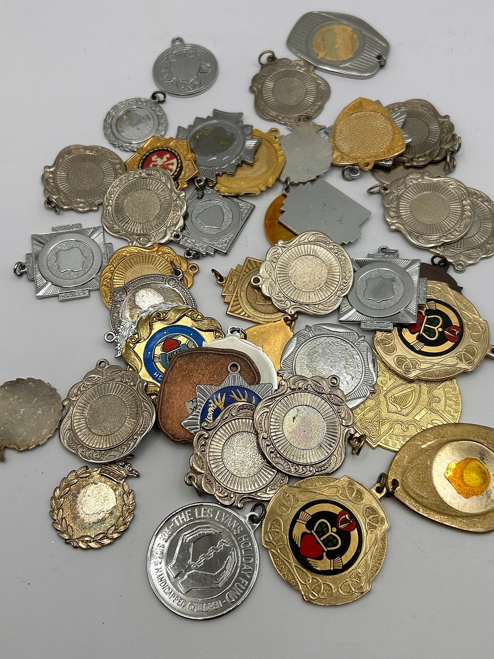Lot 493: A Collection of Approximately 60-70 Mid to Late 20th Century or Contemporary Plated Base Metal Medals and Medallions