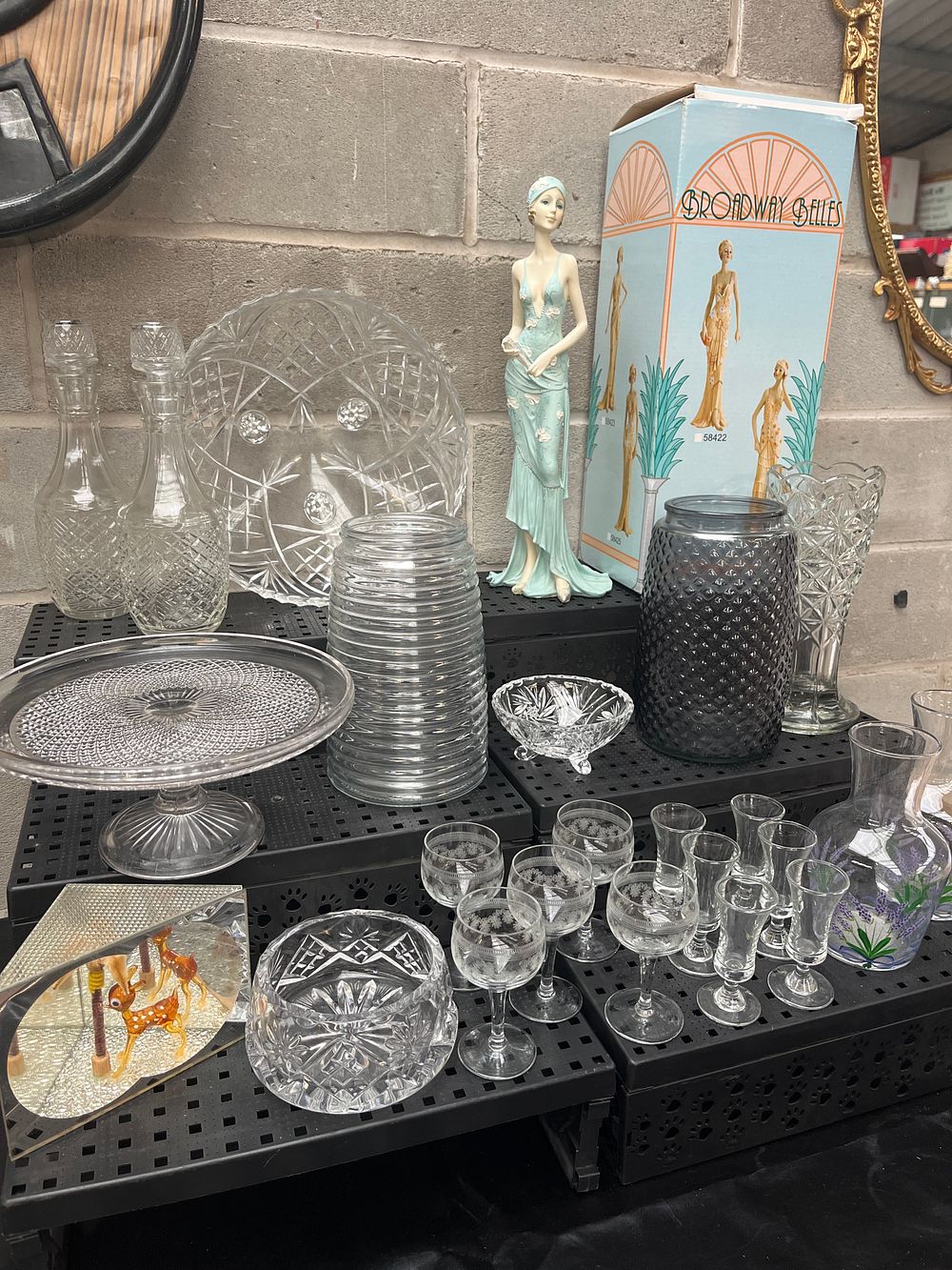 Lot 295: A Collection of 28 Mixed Glassware, Cut Crystal, and Decorative Wares including Broadway Belles Figurine