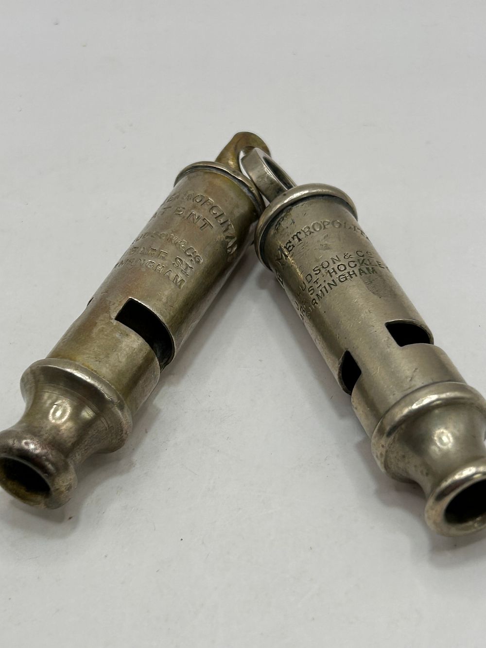 Lot 303: A Pair of Hudson & Co. Metropolitan Police Pattern Whistles