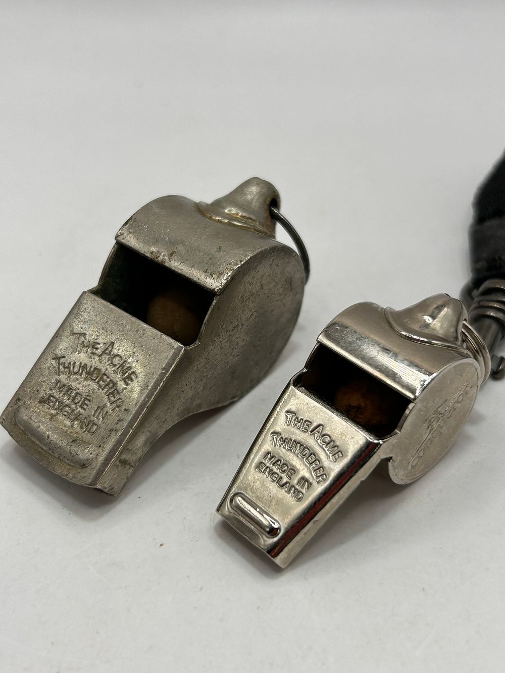 Lot 305: A Pair of Vintage The Acme Thunderer Pea Whistles