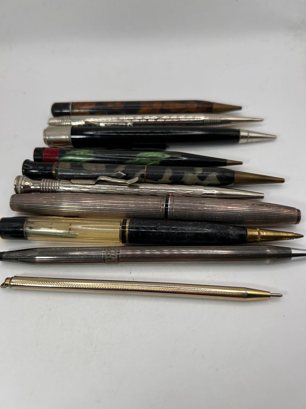 Lot 337: A Collection of 10 Vintage Writing Instruments, including Mechanical Pencils, Pens, and a Mark Cross Example
