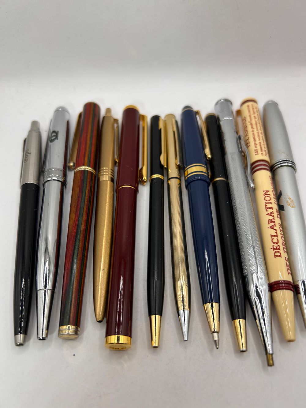 Lot 346: A Collection of Twelve Assorted Ballpoint and Rollerball Pens