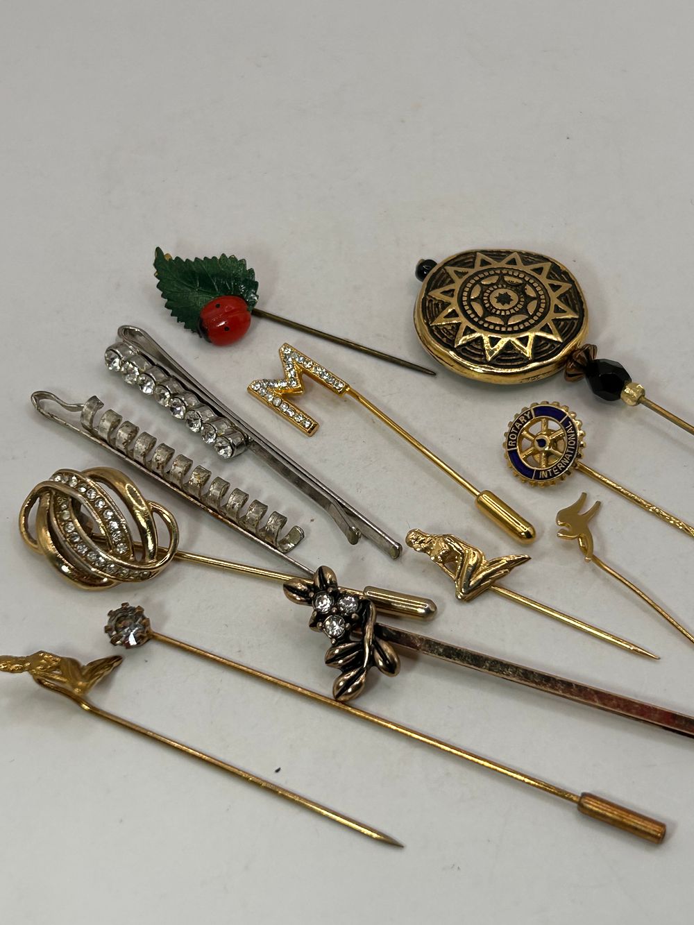 Lot 351: A Collection of 13 Vintage Costume Jewelry Stick Pins and Accessories
