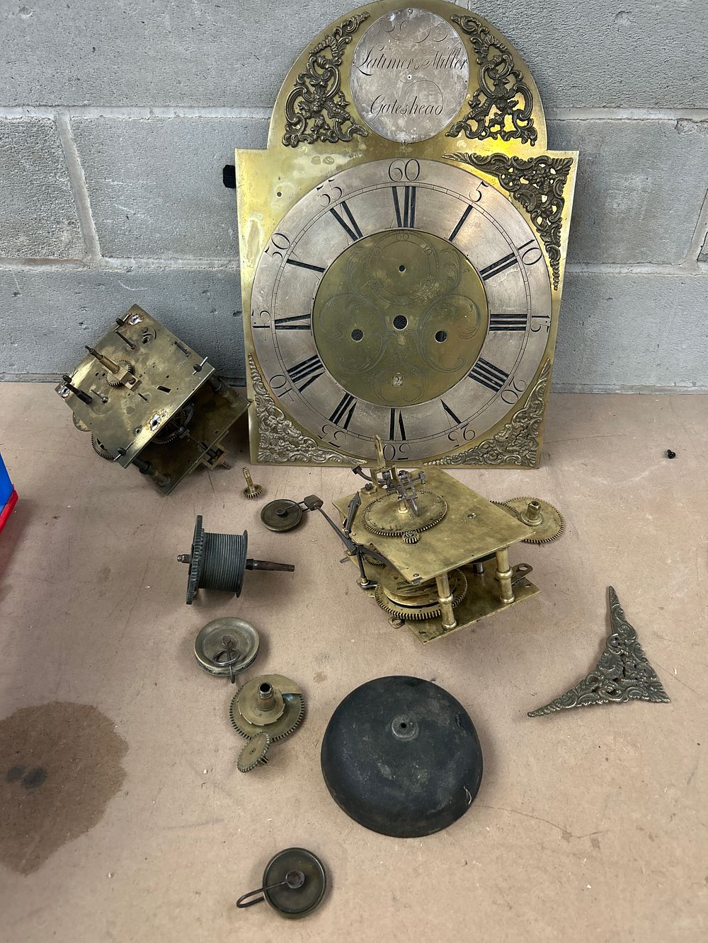 Lot 519: A Collection of  Disassembled English Longcase Clock Components by Latimer Miller, Gateshead
