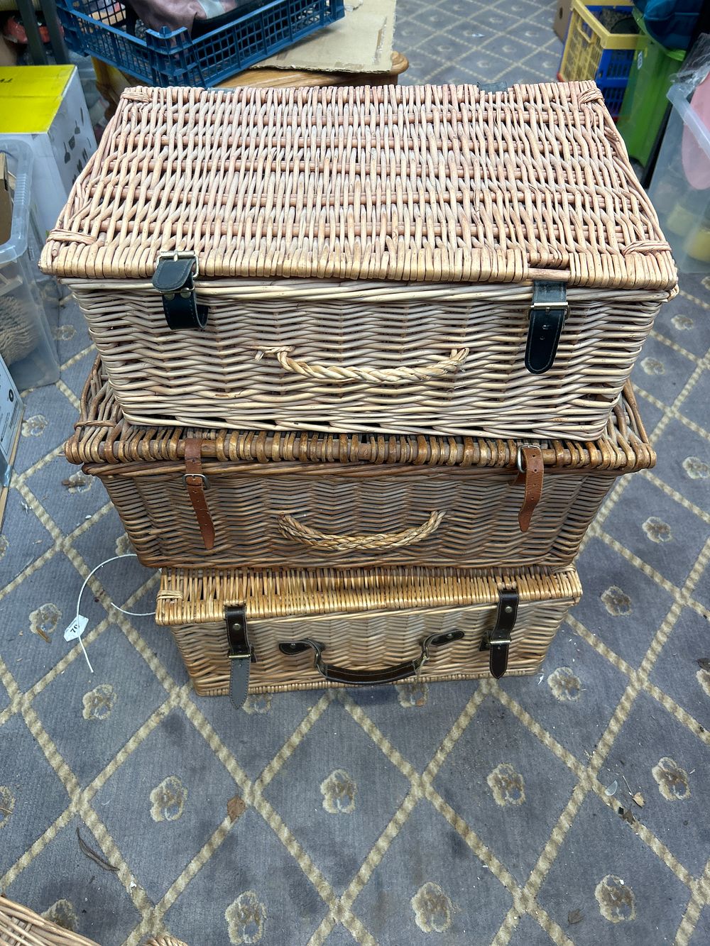 Lot 521: A Trio of Vintage Wicker Picnic Hampers with Assorted Leather Accents