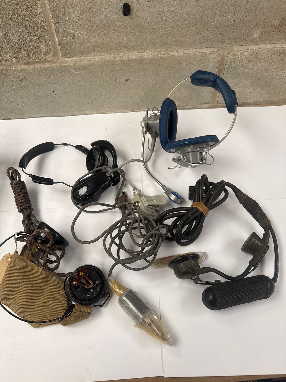 Lot 540: A Collection of 7 Vintage and WWII Era Military Communication Headsets and Components