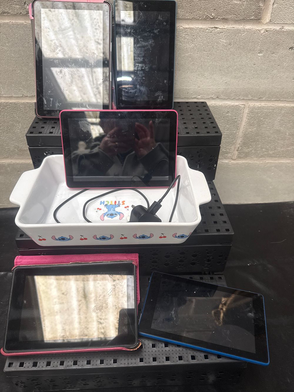 Lot 190: A Group of Five Items Including Amazon Kindle Fire Kids Edition Tablets and a Disney Stitch Ceramic Dish