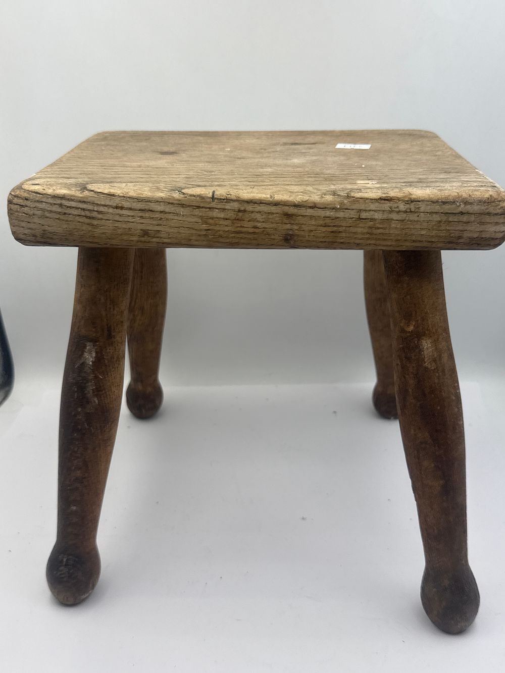 Lot 195: A Primitive Wooden Footstool