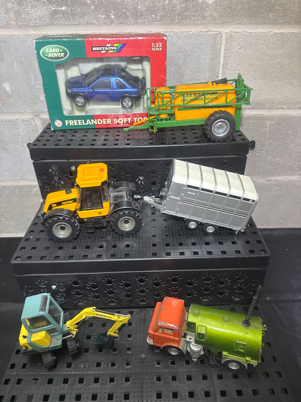 Lot 508: A Collection of Britains and Maisto Die-Cast Model Farm and Construction Vehicles