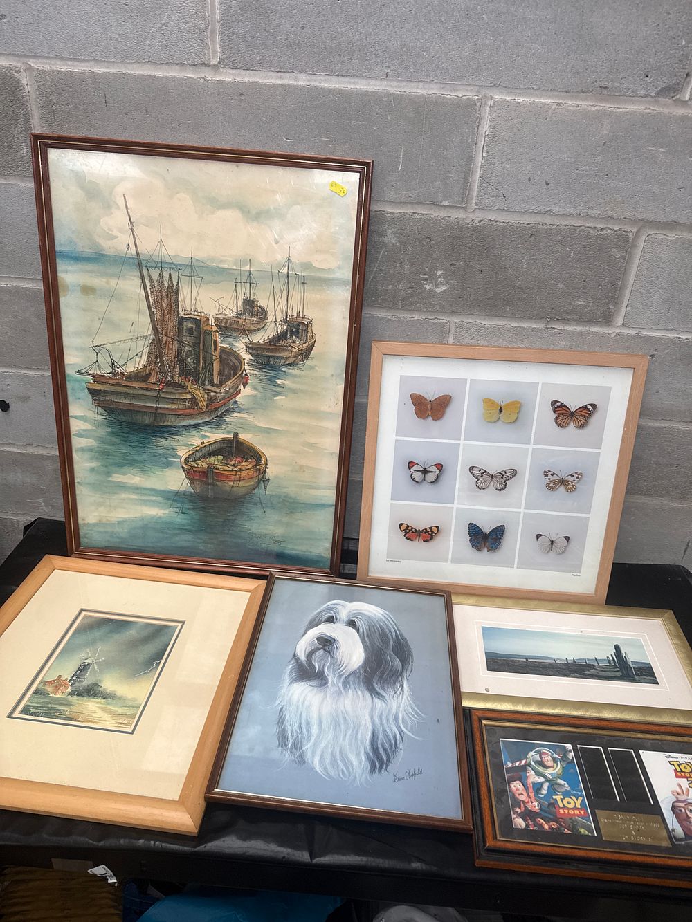 Lot 542: A Collection of 6 Framed Artworks and Memorabilia Including Disney Toy Story Film Cells