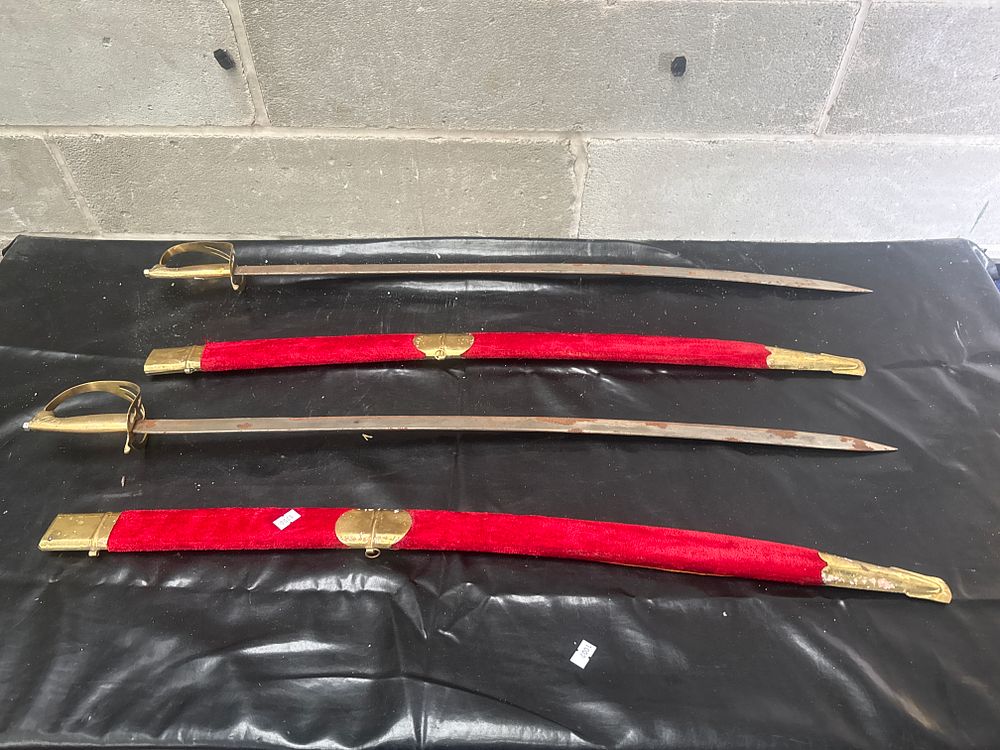 Lot 544: A Pair of 36-Inch Ceremonial Cavalry Style Sabers with Red Scabbards