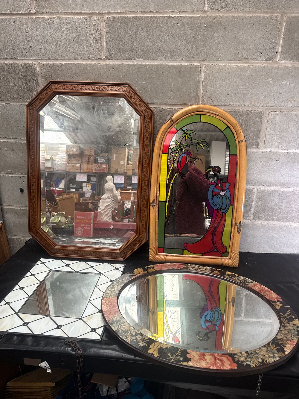 Lot 553: A Group of Four Faux Stained Glass and Decorative Home Decor Wall Mirrors