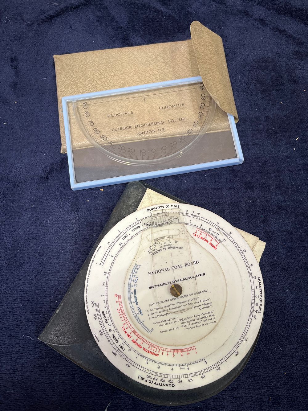 Lot 319: Two Vintage Scientific Instruments Including a National Coal Board Methane Flow Calculator and a Dr. Dollar's Clinometer