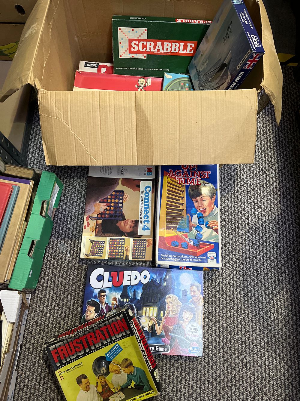 Lot 330: A Collection of Vintage Board Games and Jigsaw Puzzles including Ideal Up Against Time