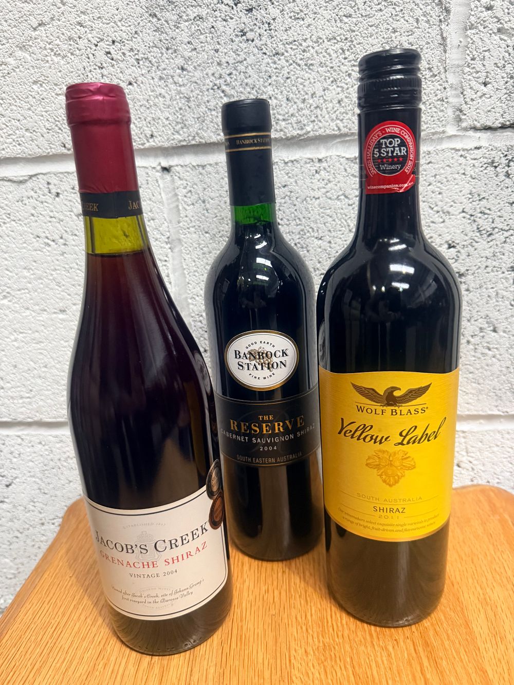 Lot 347: Three Bottles of Australian Red Wine including Wolf Blass Yellow Label Shiraz 2011