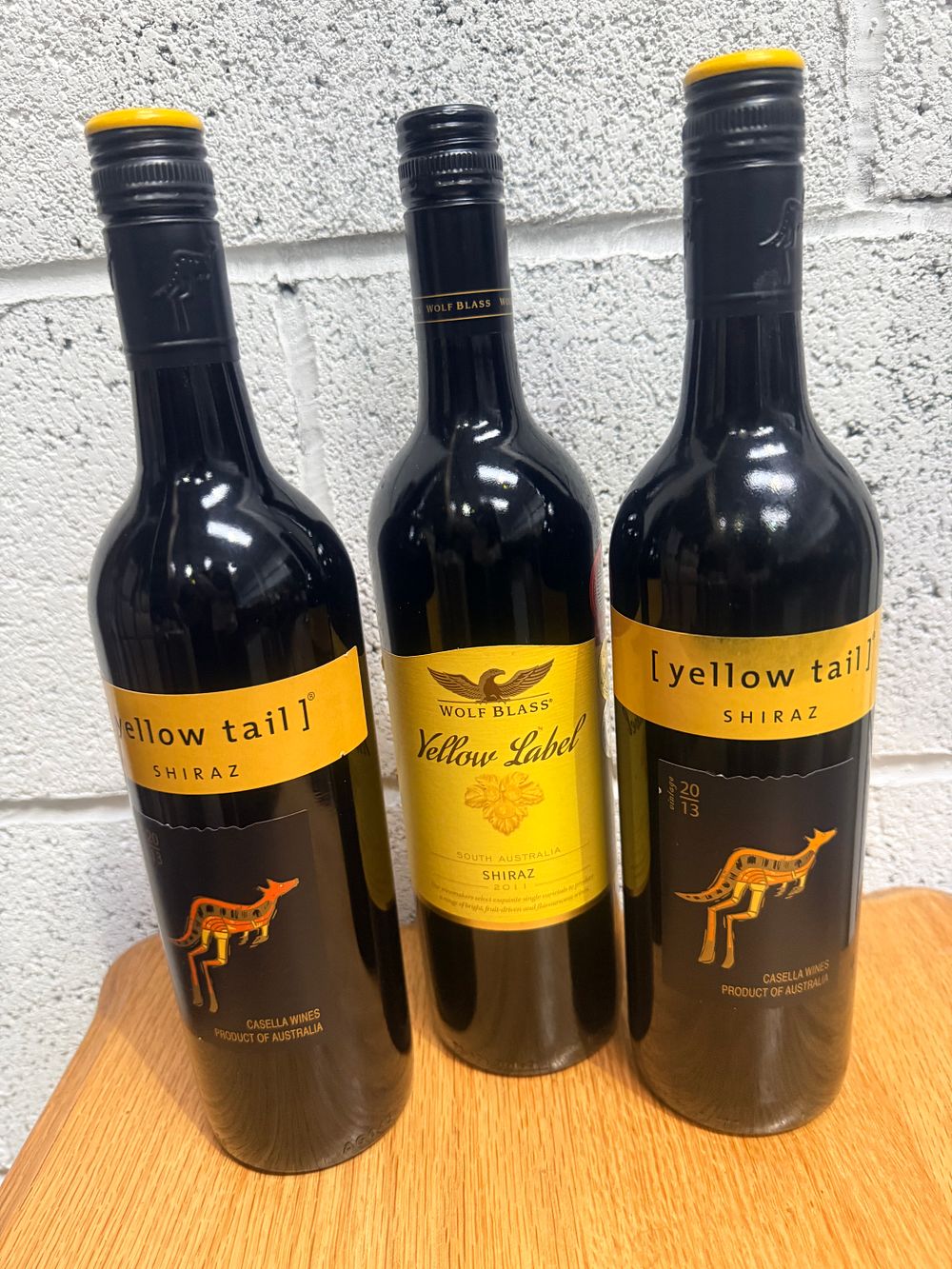 Lot 348: A Trio of Australian Shiraz Red Wines Including yellow tail and Wolf Blass