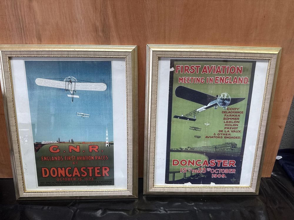 Lot 387: A Pair of Framed Star Editions Englands First Aviation Races at Doncaster 1909 Reproduction Posters