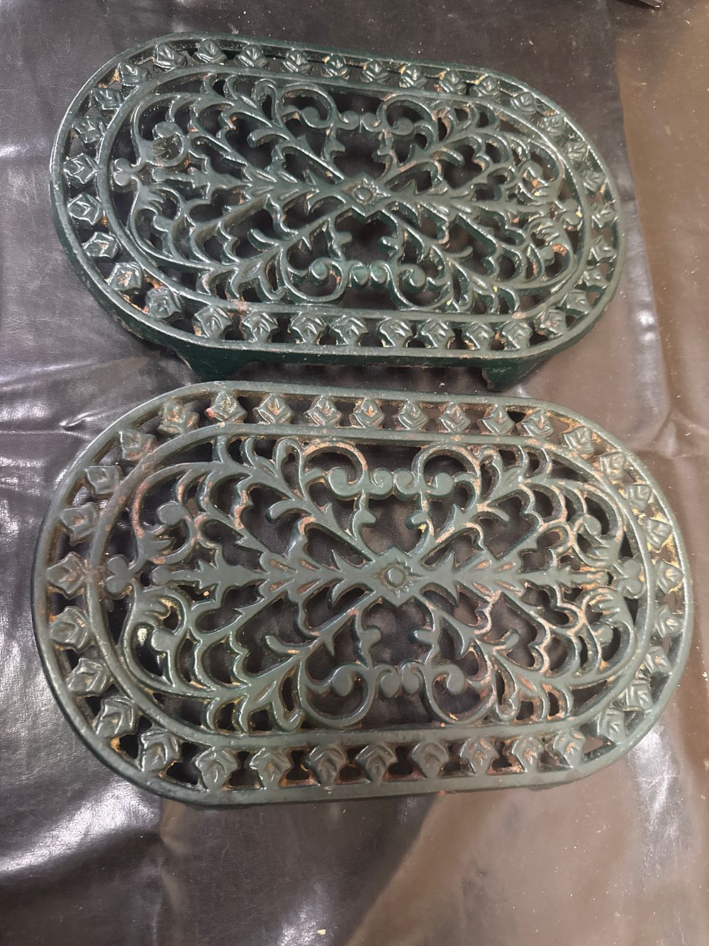 Lot 389: A Pair of Robert Welch Traditional Cast Iron Trivets