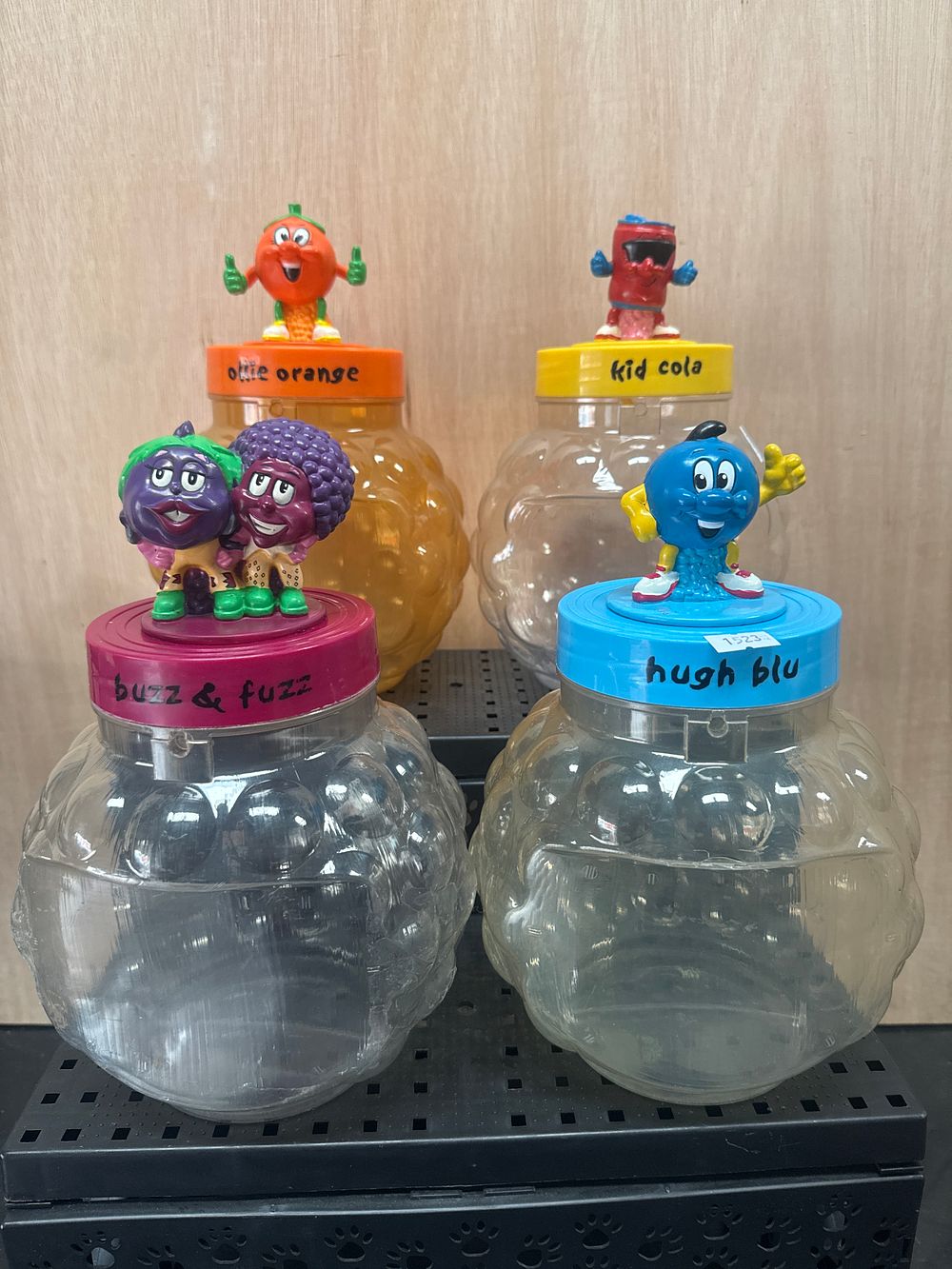 Lot 404: A Collection of Novelty Plastic Character Jars