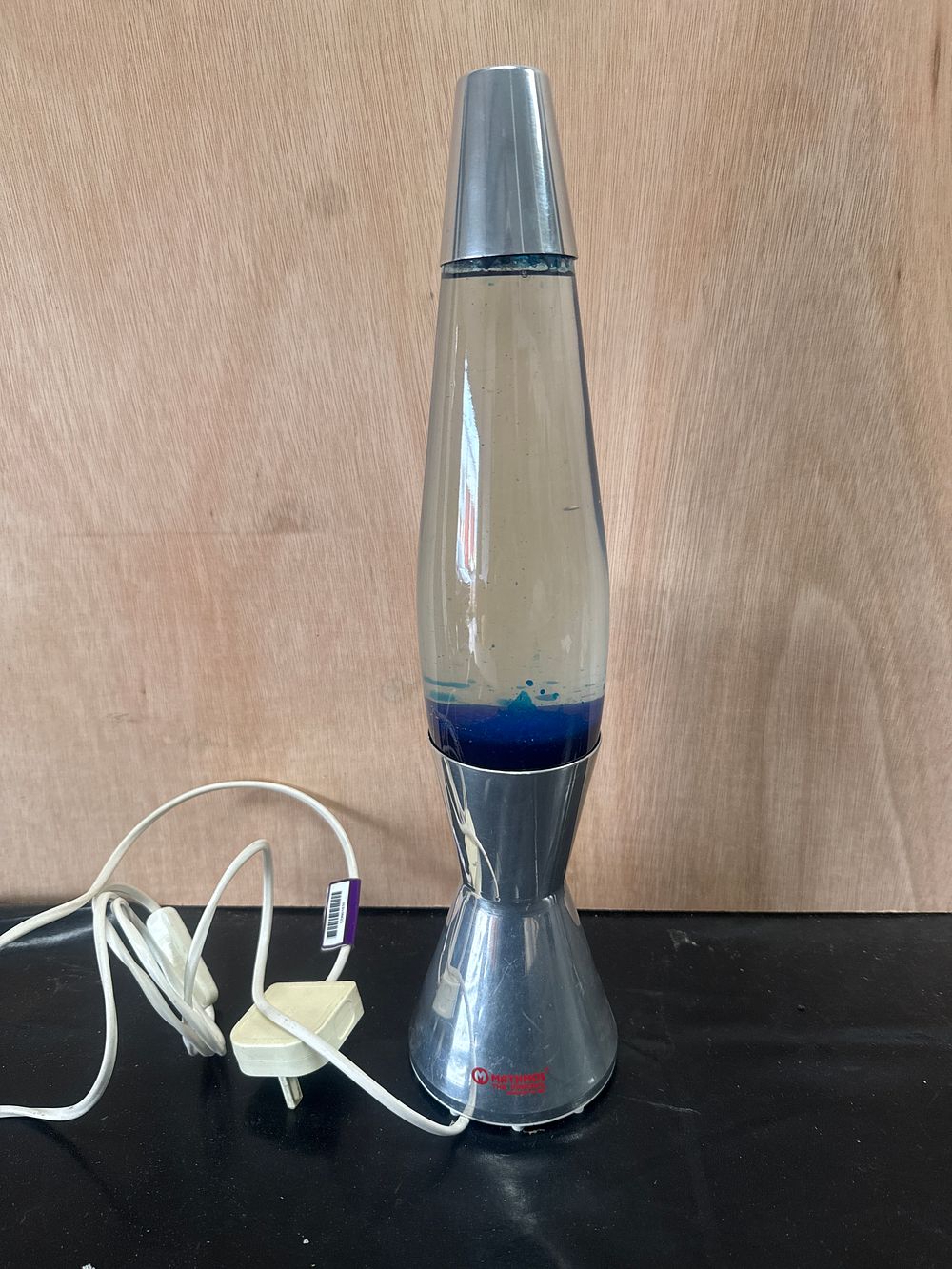 Lot 408: A Mathmos Astro 17 Inch Lava Lamp with Blue Wax and Chrome Finish