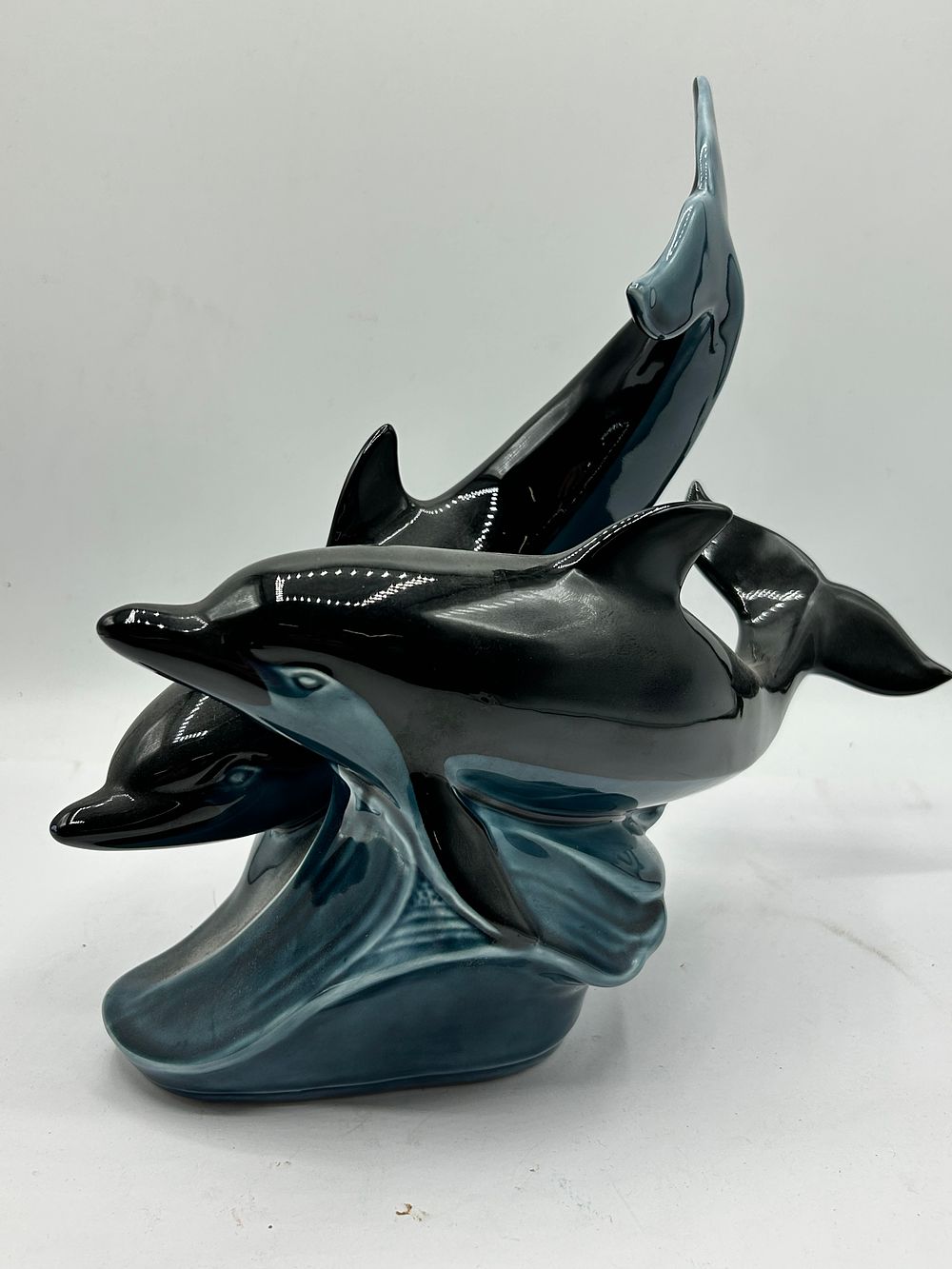 Lot 420: Poole Pottery Blue Dolphin Glaze Leaping Dolphins and Wave Figurine