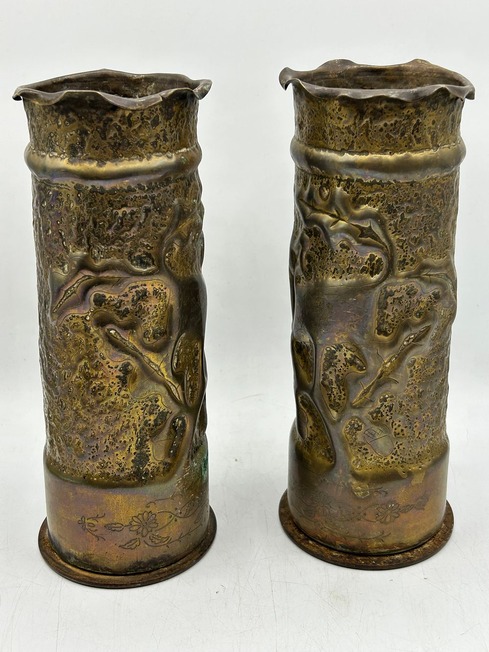 Lot 432: A Pair of WWI-Era Trench Art Artillery Shell Vases