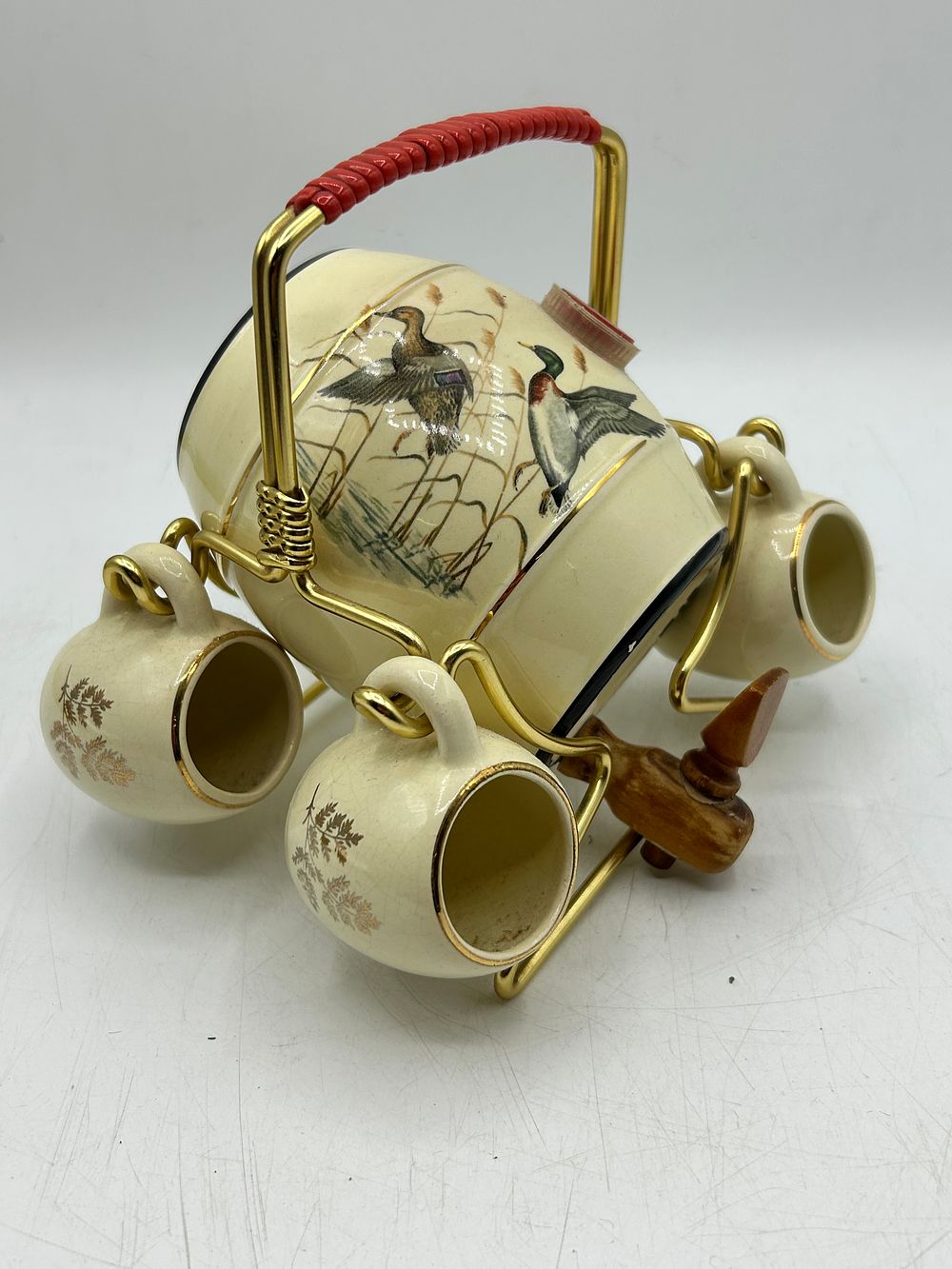 Lot 433: A Set of Vintage Ceramic Barrel Decanter and Cups with Mallard Duck Motif