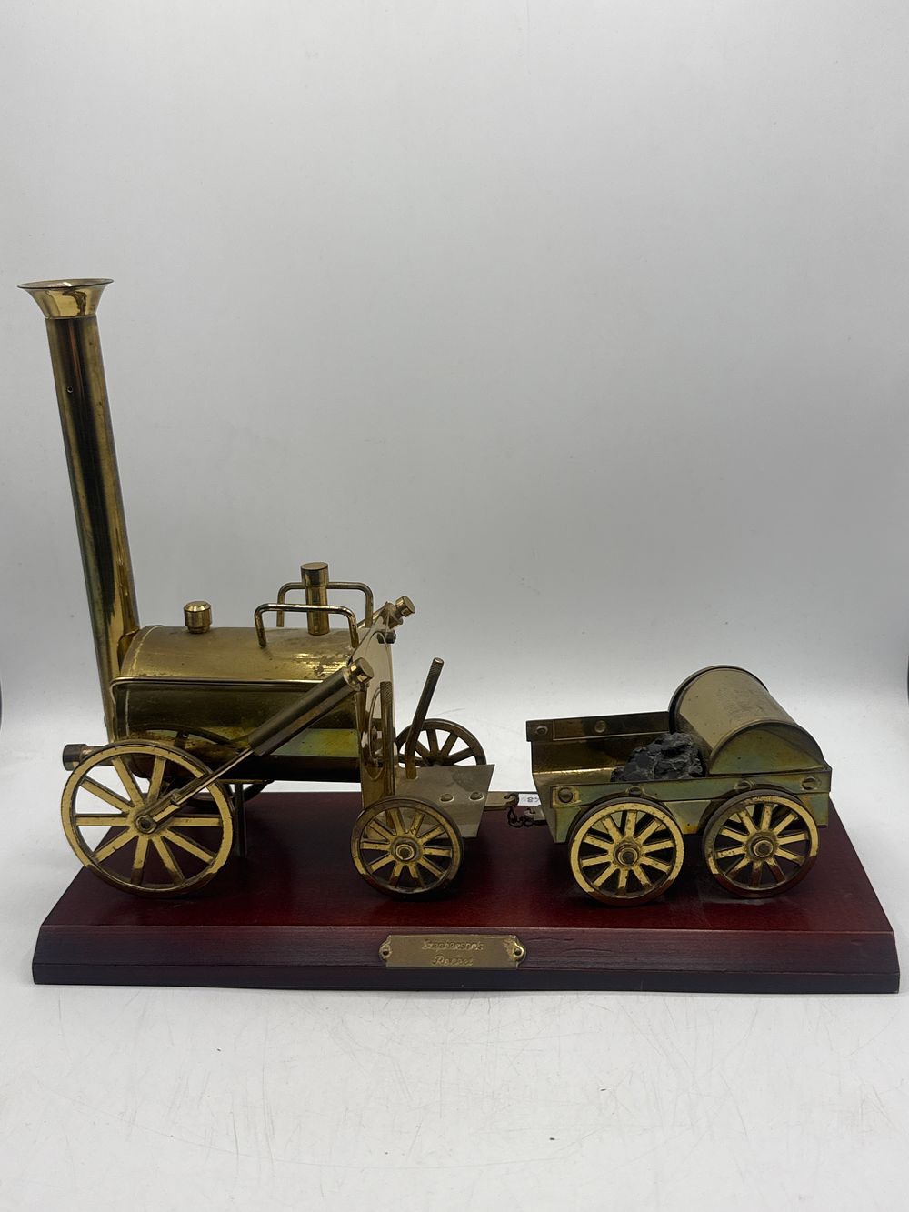 Lot 445: A Vintage Brass Model of Stephenson's Rocket Steam Locomotive