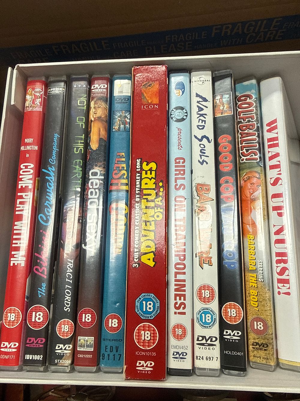 Lot 446: Eleven Adult Movies and Cult Comedy DVDs