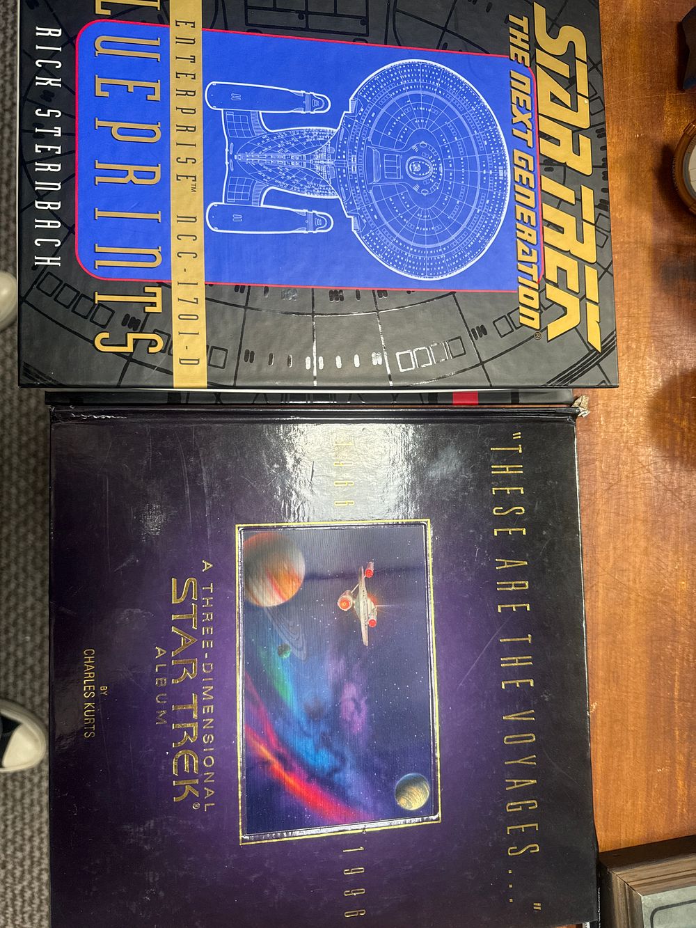 Lot 449: A Trio of Star Trek Publications including These Are The Voyages Three-Dimensional Album and Enterprise Blueprints