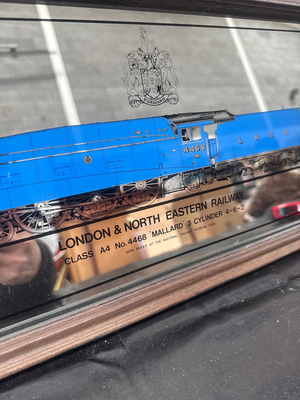 Lot 453: A Framed LNER Class A4 No. 4468 Mallard Commemorative Mirror measuring 19 x 9 inches