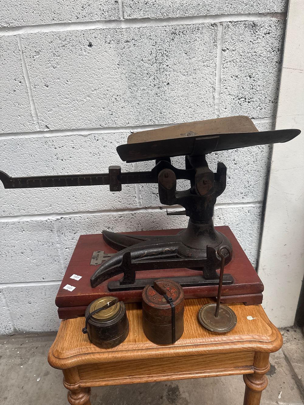 Lot 474: An Antique S. Mordan and Co. Brass and Cast Iron Postal Scale with Weights