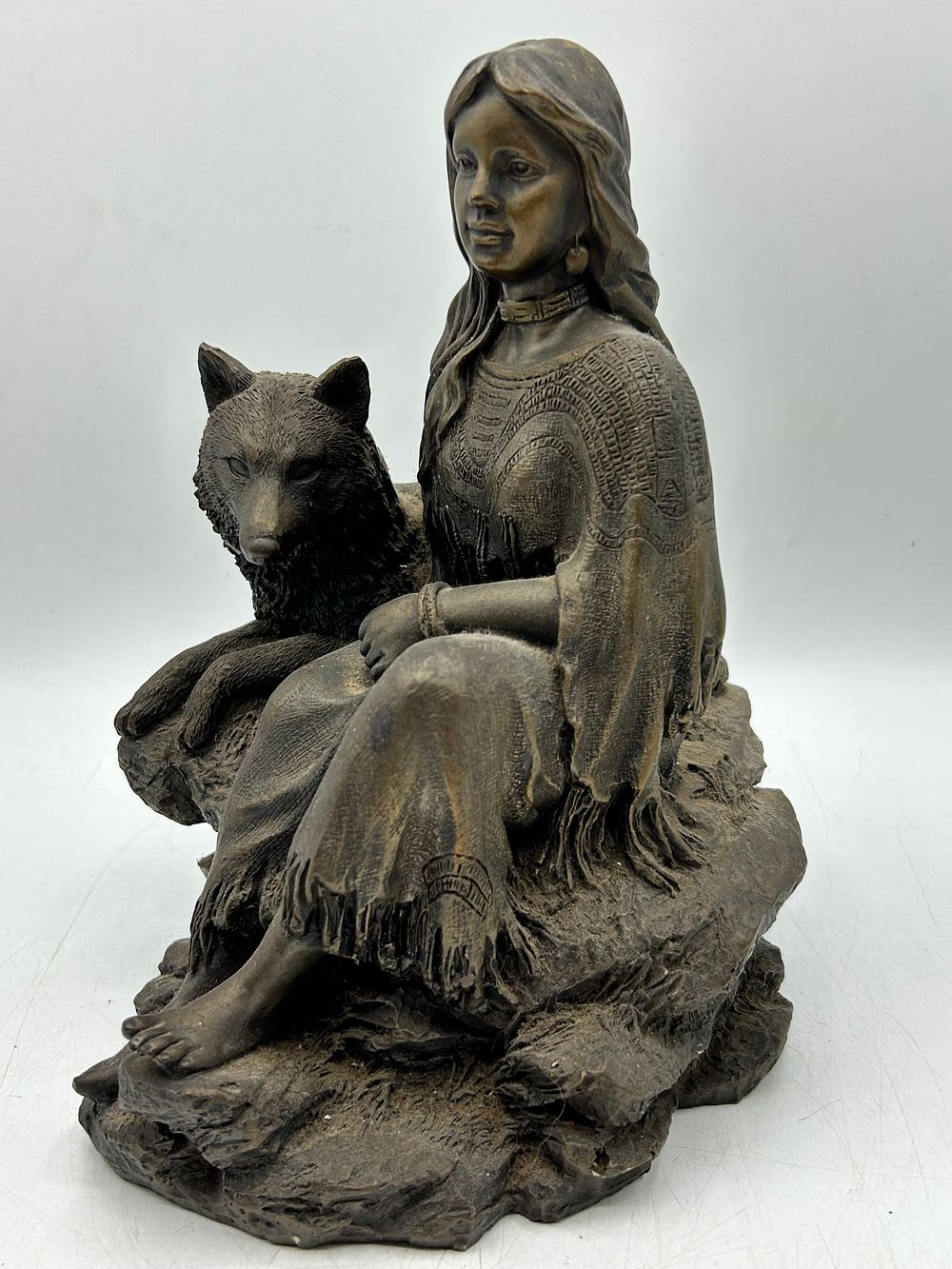 Lot 478: A 1991 Rose Cold-Cast Bronze Figurine of a Native American Woman with Wolf