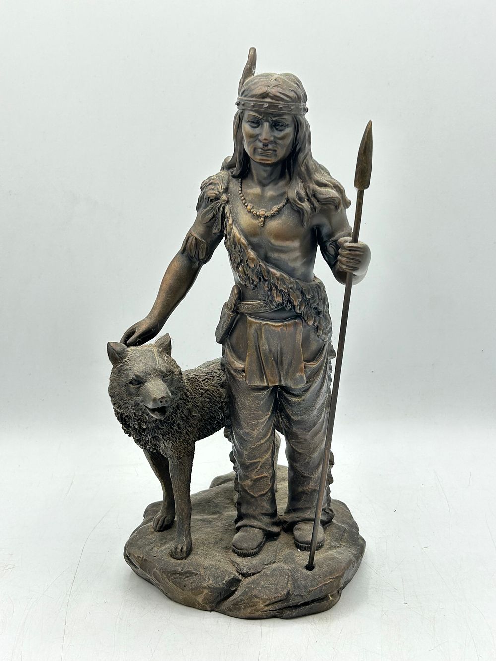 Lot 479: A Crosa Bronze-Effect Sculpture of a Native American Warrior and Wolf