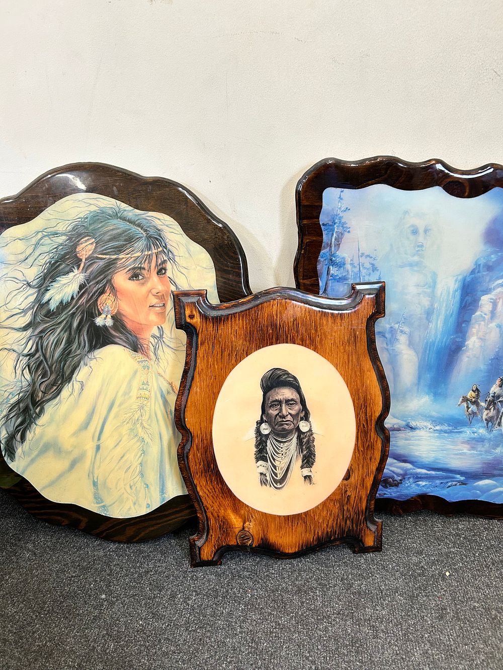 Lot 484: A Trio of S. Garcia Native American Themed Lacquered Wood Wall Plaques