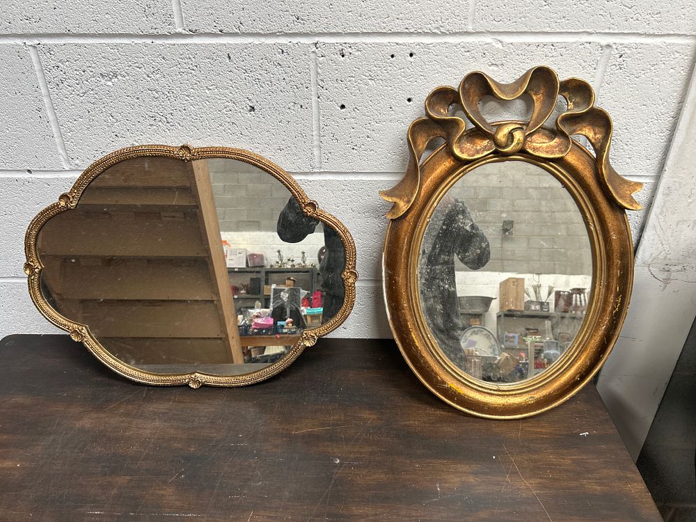 Lot 423: Two Gilt-Framed Wall Mirrors including a Ribbon-Crested Oval Example