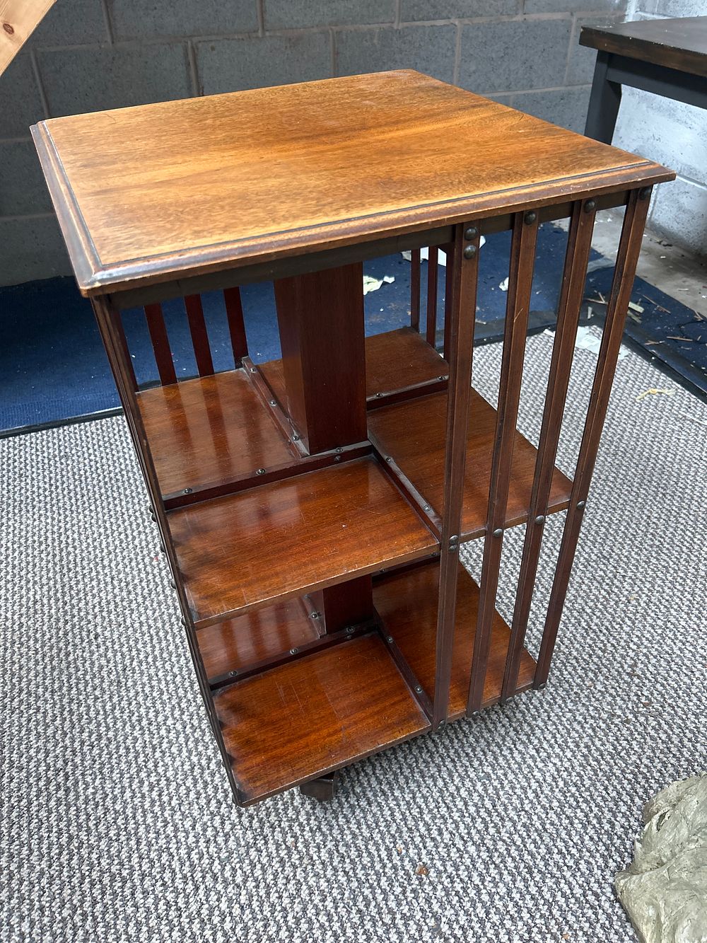 Lot 424: A Sheraton Style Mahogany Revolving Bookcase, 33 Inches Tall