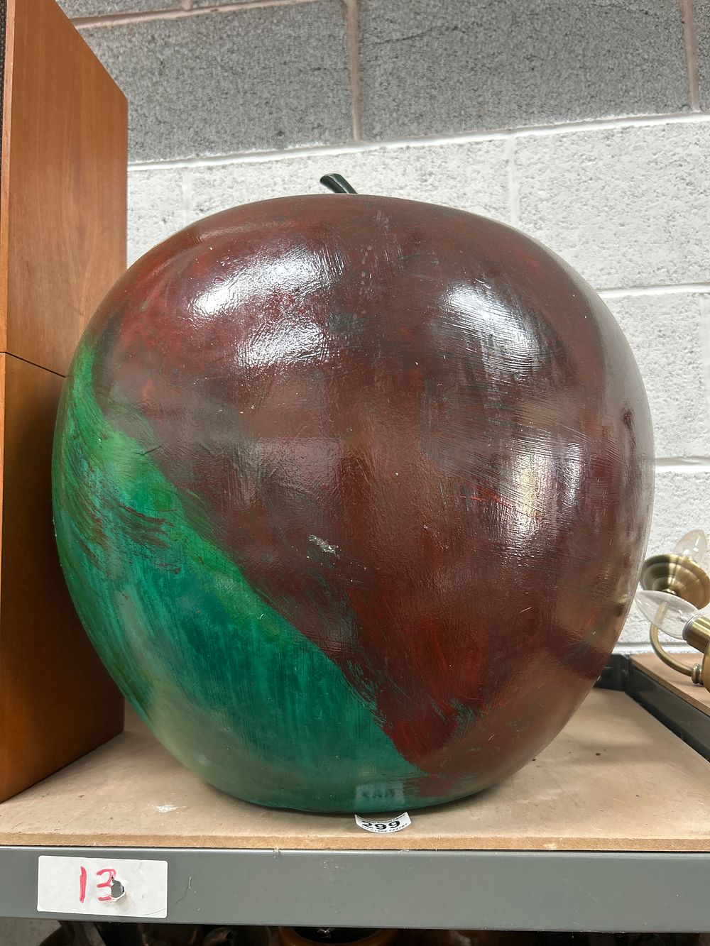 Lot 431: A Large Apple-Form Decorative Sculpture in the Style of Oxidised Copper