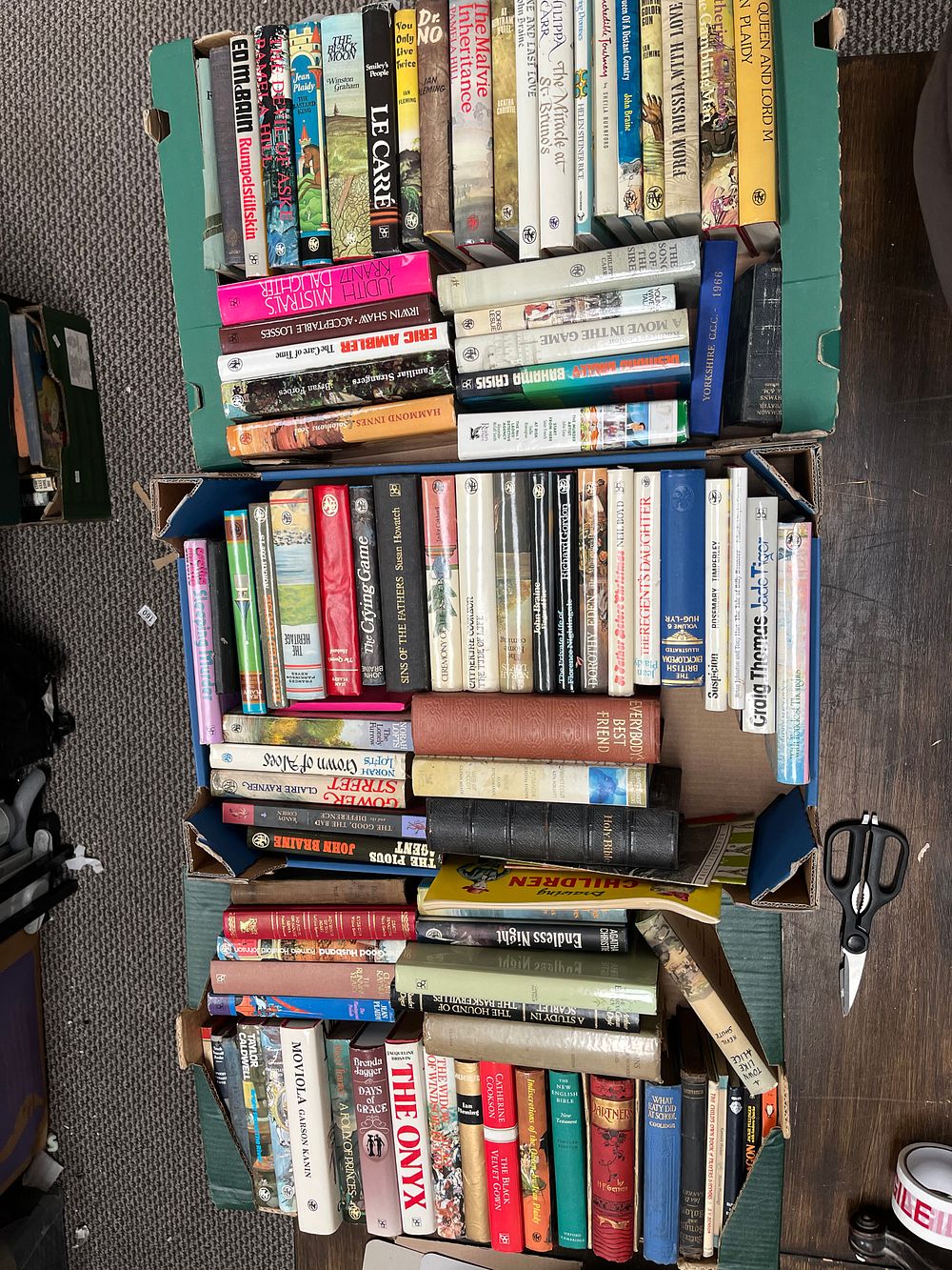 Lot 452: A Collection of Mid-to-Late 20th Century Fiction and Non-Fiction Books, CDs, and DVDs