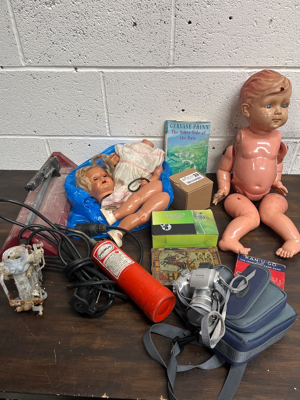Lot 491: An Assortment of Vintage and Modern Collectables, Toys, and Household Equipment