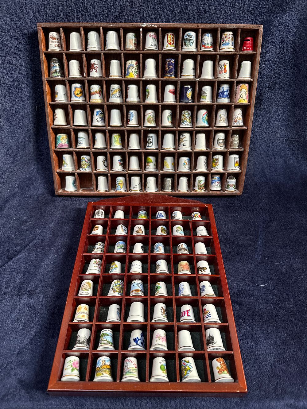 Lot 545: A Collection of Souvenir and Decorative Thimbles in Two Wooden Display Cases