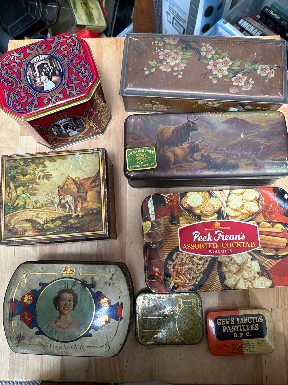 Lot 555: A Collection of Vintage Lithographed Metal Advertising and Commemorative Tins