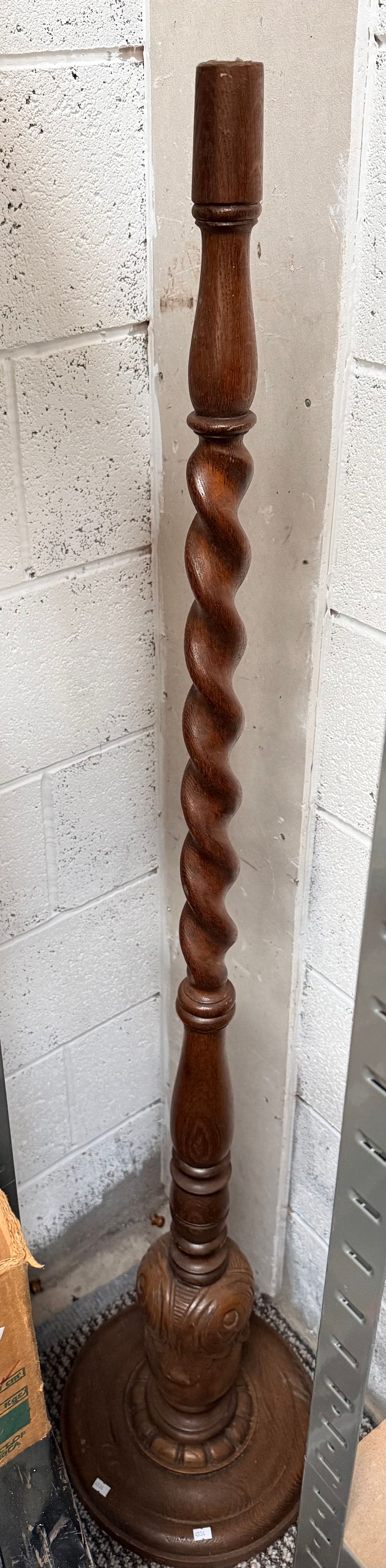 Lot 559: A carved oak barley twist floor lamp base