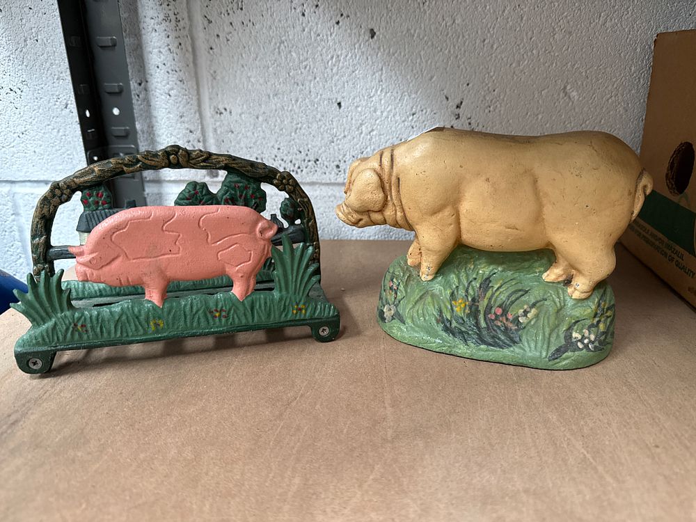 Lot 565: Two Painted Cast Iron Pig-Themed Decorative Items