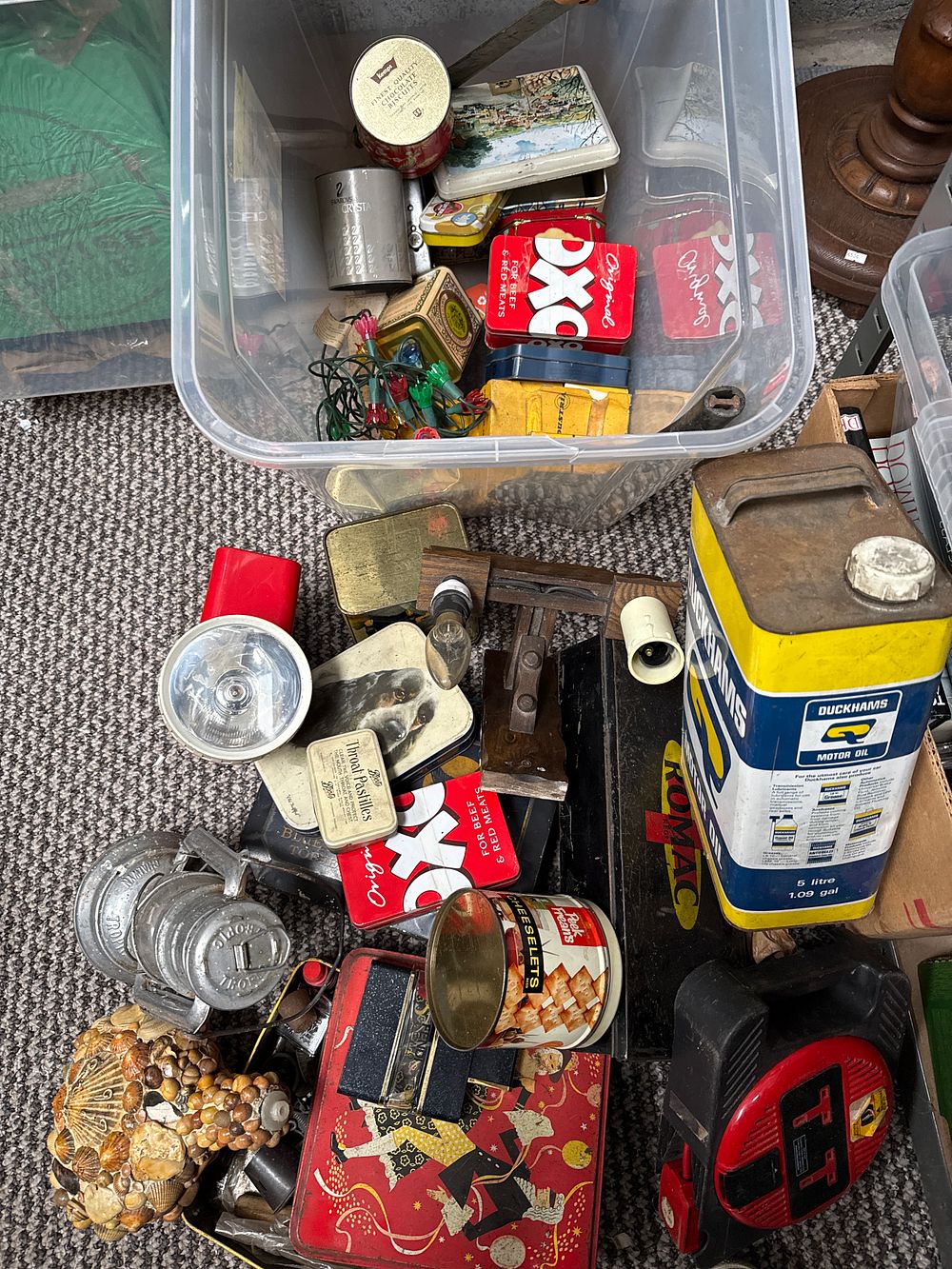 Lot 568: An Assortment of Vintage Advertising Tins, Automobilia, and Household Collectibles