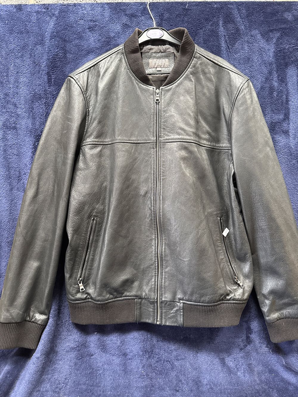 Lot 575: A men's black grained leather bomber jacket
