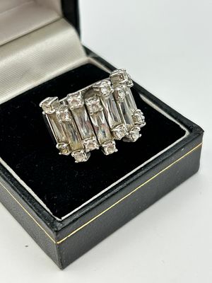 A Contemporary Silver Tiered Baguette Cut Cocktail Ring